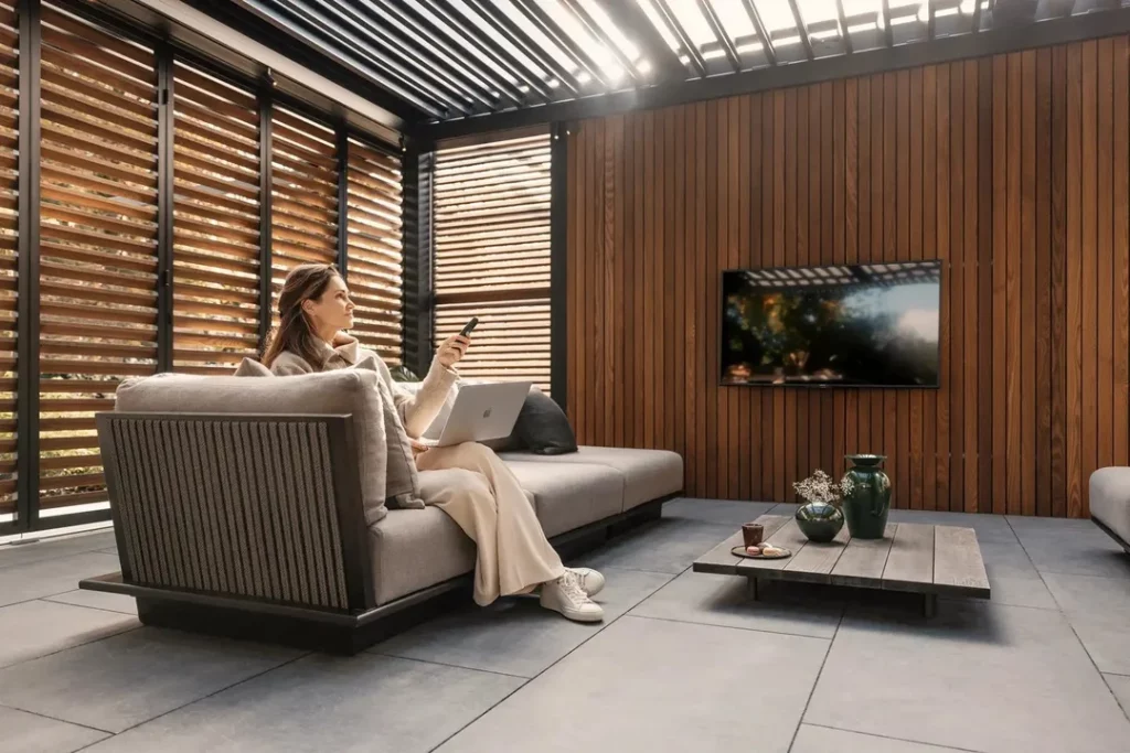 Extensión exterior con pérgola Amani de Renson